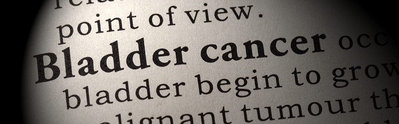 Close‑up of the words “Bladder cancer” highlighted in a dictionary or textbook, representing information and awareness about bladder cancer symptoms, causes, early detection and urologist treatment in Indore by Dr. Pritesh Shrimali, best urologist in Indore.
